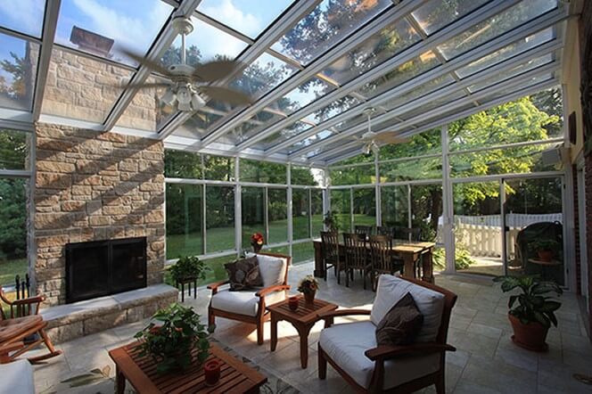 Four Seasons Sunroom with glass ceiling and nice dining area.